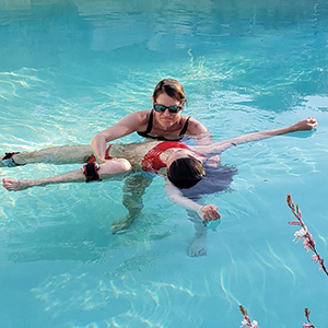 Photo of Megan in pool
